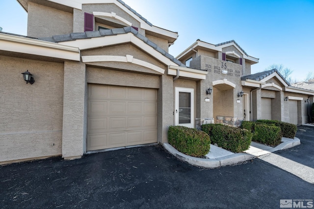 townhome / multi-family property with stucco siding