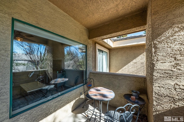 view of patio / terrace featuring a balcony