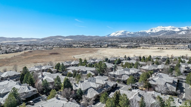 property view of mountains featuring a residential view