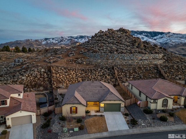 drone / aerial view featuring a mountain view