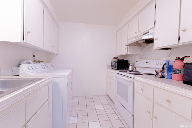 clothes washing area with laundry area, light tile patterned floors, and independent washer and dryer