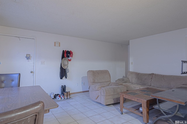 living area featuring light tile patterned floors