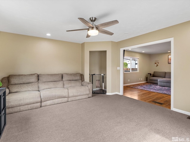 unfurnished living room featuring ceiling fan, recessed lighting, carpet flooring, visible vents, and baseboards