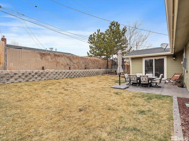 view of yard featuring a patio and a fenced backyard