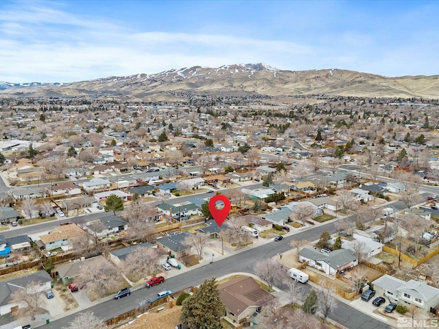 bird's eye view with a residential view and a mountain view