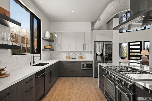 kitchen featuring white cabinetry, light wood-style floors, black appliances, open shelves, and modern cabinets