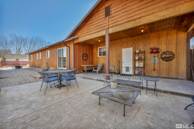 view of patio with outdoor dining space