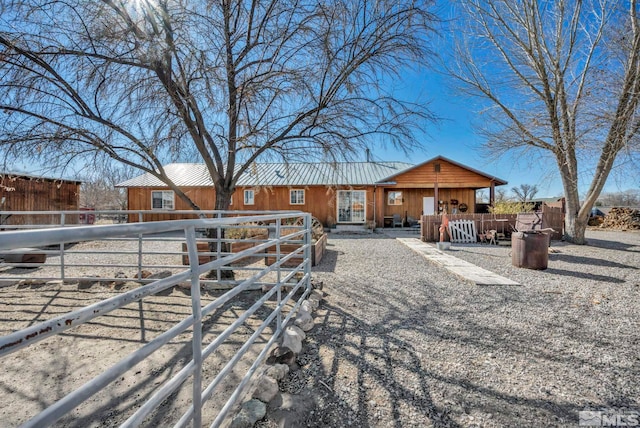 view of front of property with metal roof