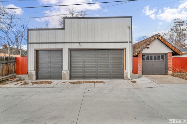 detached garage with fence