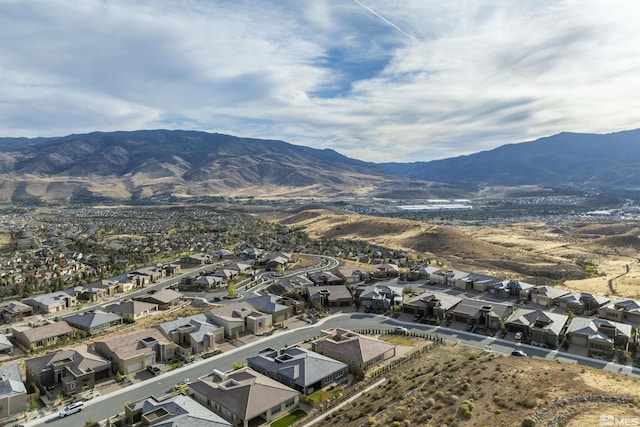 birds eye view of property featuring a residential view and a mountain view