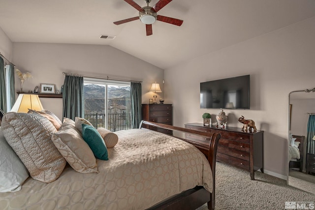 carpeted bedroom featuring lofted ceiling, ceiling fan, visible vents, baseboards, and access to exterior