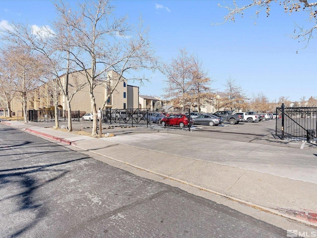 view of road with curbs and sidewalks