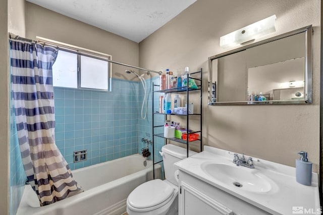 bathroom featuring shower / tub combo with curtain, vanity, and toilet