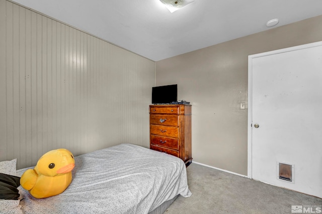 carpeted bedroom with baseboards