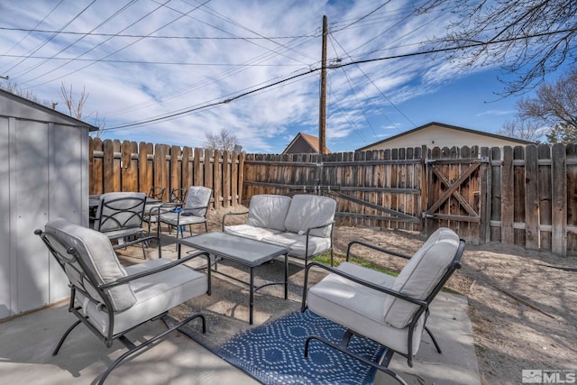 view of patio with a fenced backyard and an outdoor living space