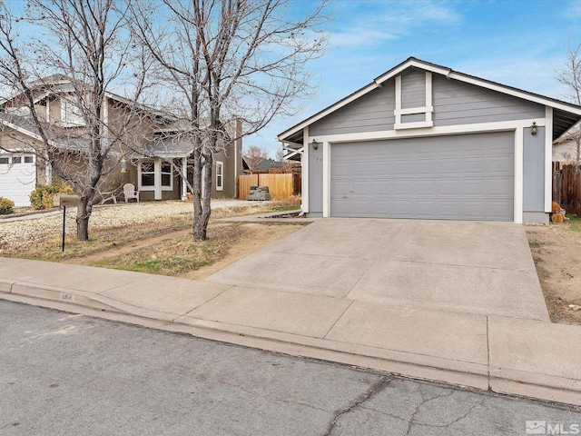 view of front of house featuring fence