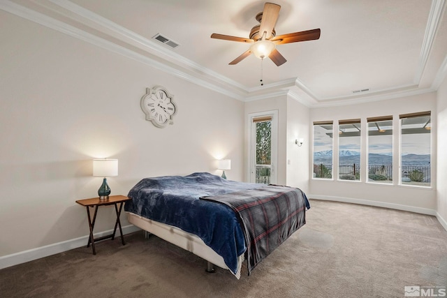 bedroom featuring carpet floors, baseboards, visible vents, and ornamental molding