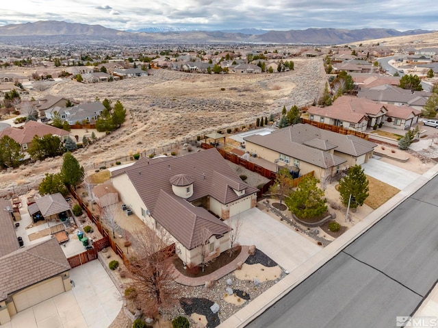 aerial view with a mountain view and a residential view