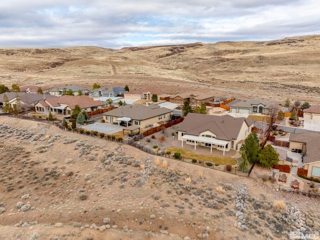 aerial view featuring a residential view and a mountain view