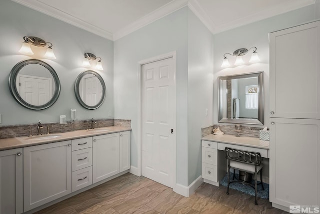 bathroom with double vanity, ornamental molding, and a sink