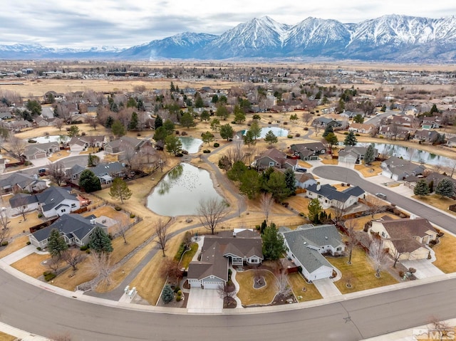 aerial view featuring a mountain view and a residential view