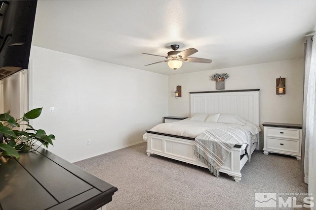 bedroom with carpet, baseboards, and a ceiling fan