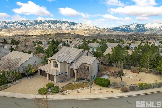 birds eye view of property featuring a residential view and a mountain view