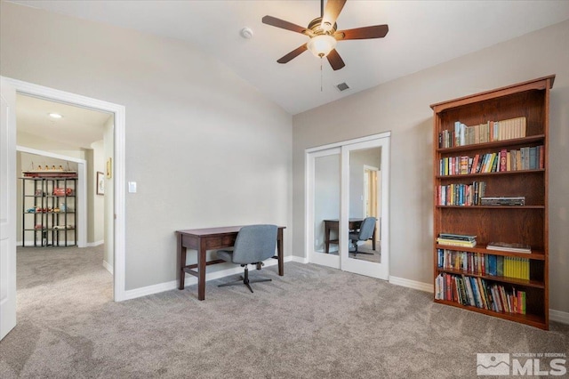 sitting room with visible vents, baseboards, lofted ceiling, carpet, and french doors