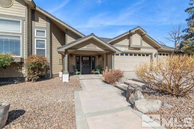 view of front of property featuring an attached garage