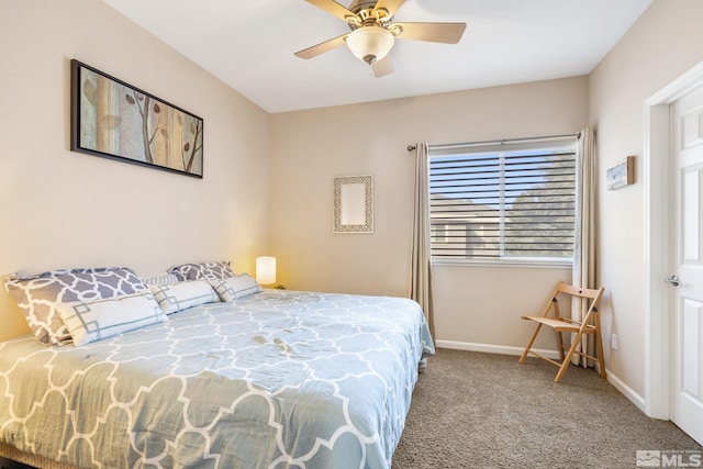 bedroom featuring ceiling fan, carpet, and baseboards