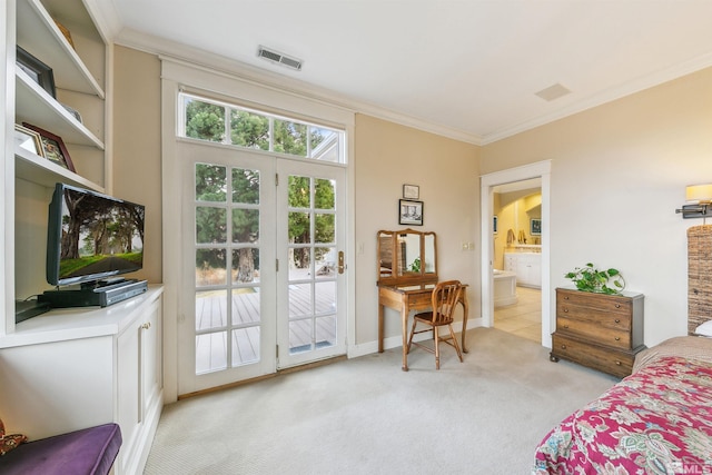 bedroom featuring connected bathroom, light colored carpet, visible vents, baseboards, and crown molding