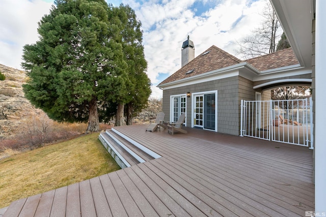 deck featuring a lawn