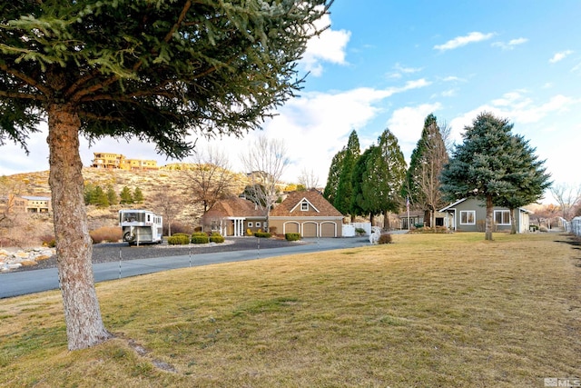 view of yard with a garage