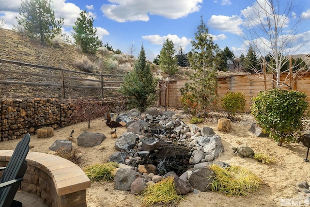 view of yard featuring fence