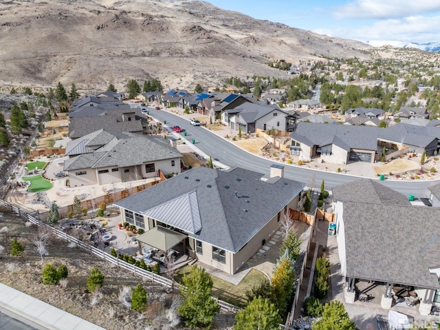 birds eye view of property featuring a residential view and a mountain view