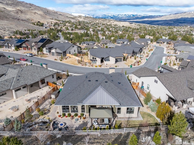 drone / aerial view with a mountain view and a residential view