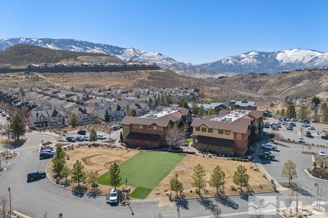 bird's eye view featuring a residential view and a mountain view