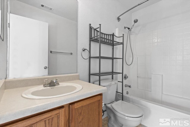 full bath with a textured wall, toilet, shower / bath combination, vanity, and visible vents