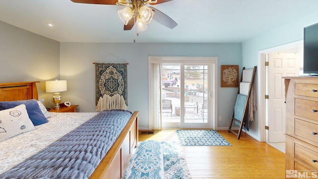 bedroom with visible vents, baseboards, ceiling fan, access to exterior, and light wood-style floors