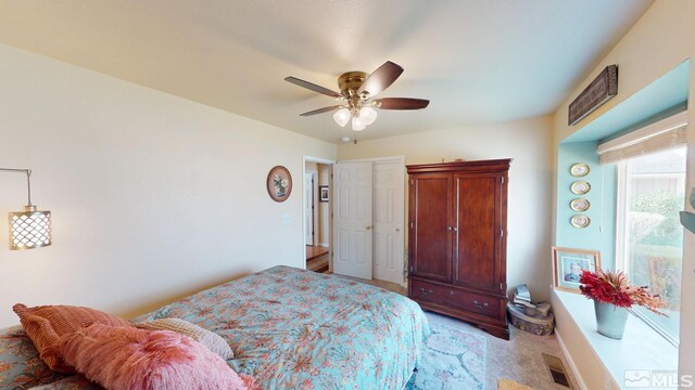 bedroom featuring visible vents, ceiling fan, and baseboards