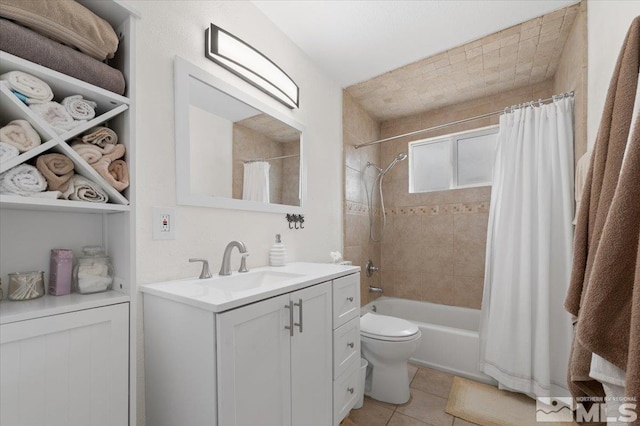 bathroom with toilet, shower / bath combo, vanity, and tile patterned floors