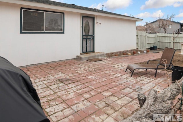 view of patio with fence