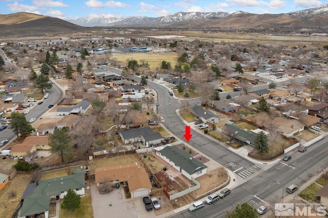 birds eye view of property featuring a residential view and a mountain view