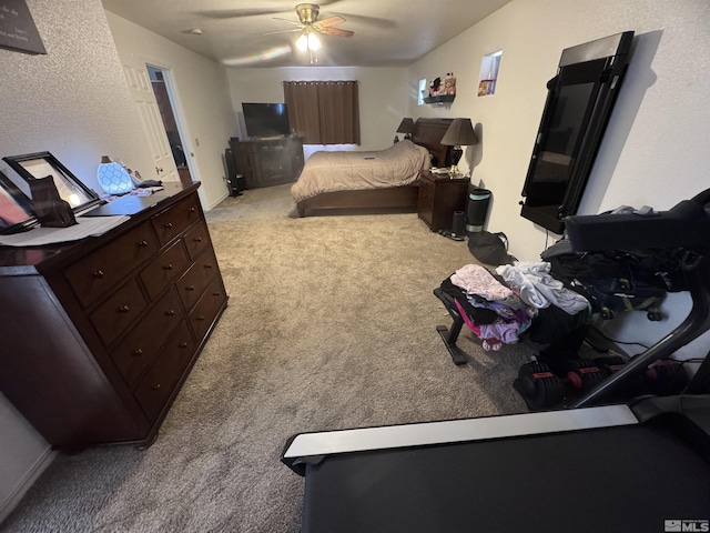 bedroom featuring carpet and ceiling fan