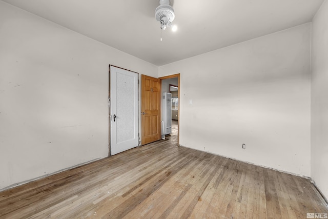 spare room featuring hardwood / wood-style flooring