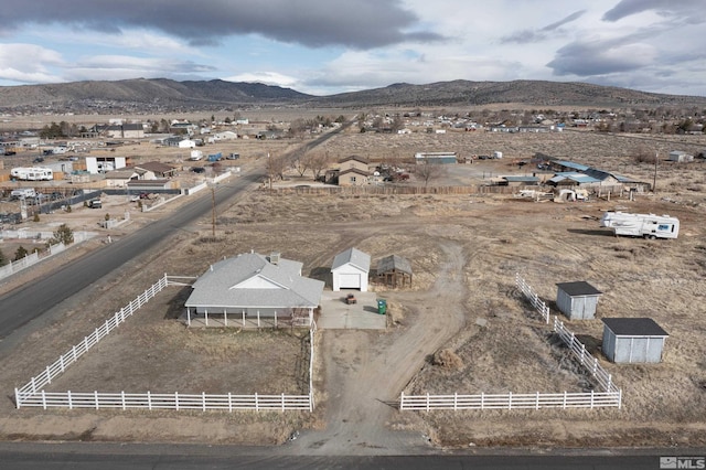 drone / aerial view with a rural view and a mountain view