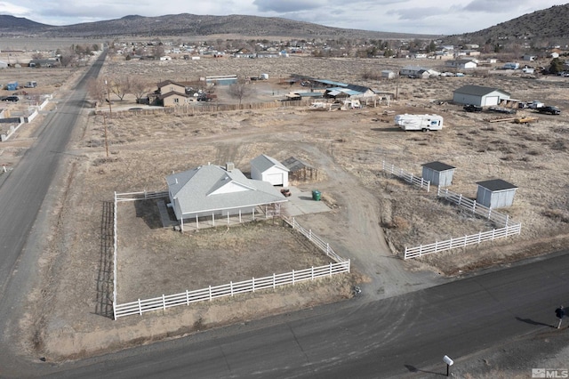 bird's eye view featuring a mountain view and a rural view