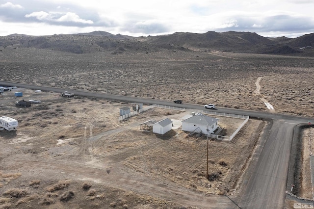 drone / aerial view featuring a rural view and a mountain view