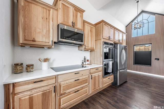 kitchen featuring dark wood finished floors, an inviting chandelier, stainless steel appliances, light countertops, and light brown cabinets