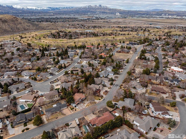 bird's eye view featuring a residential view and a mountain view